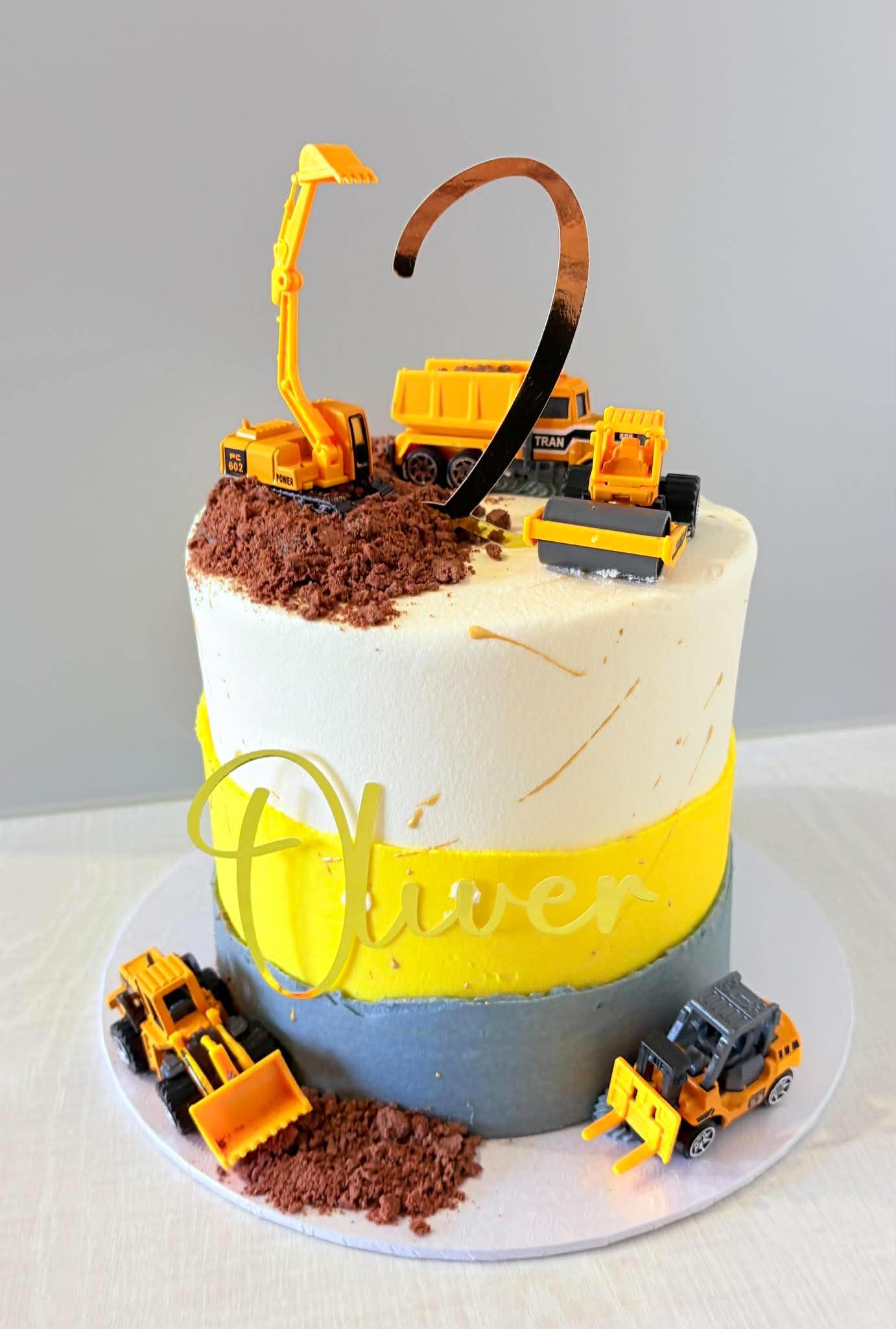 Construction vehicle themed second birthday cake