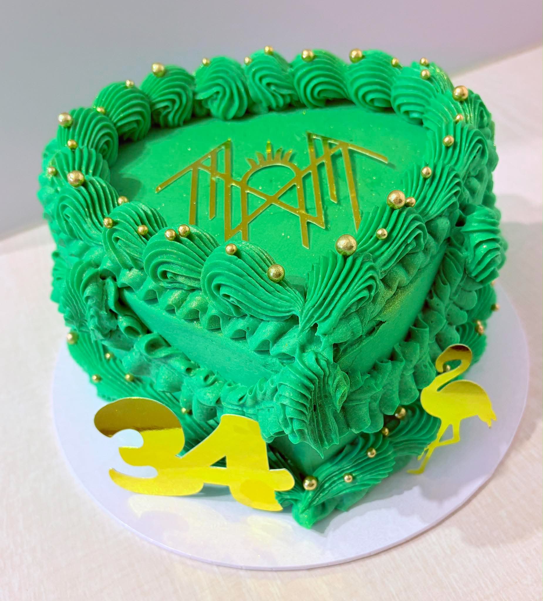 Emerald green 34th birthday cake with ruffled buttercream and gold details