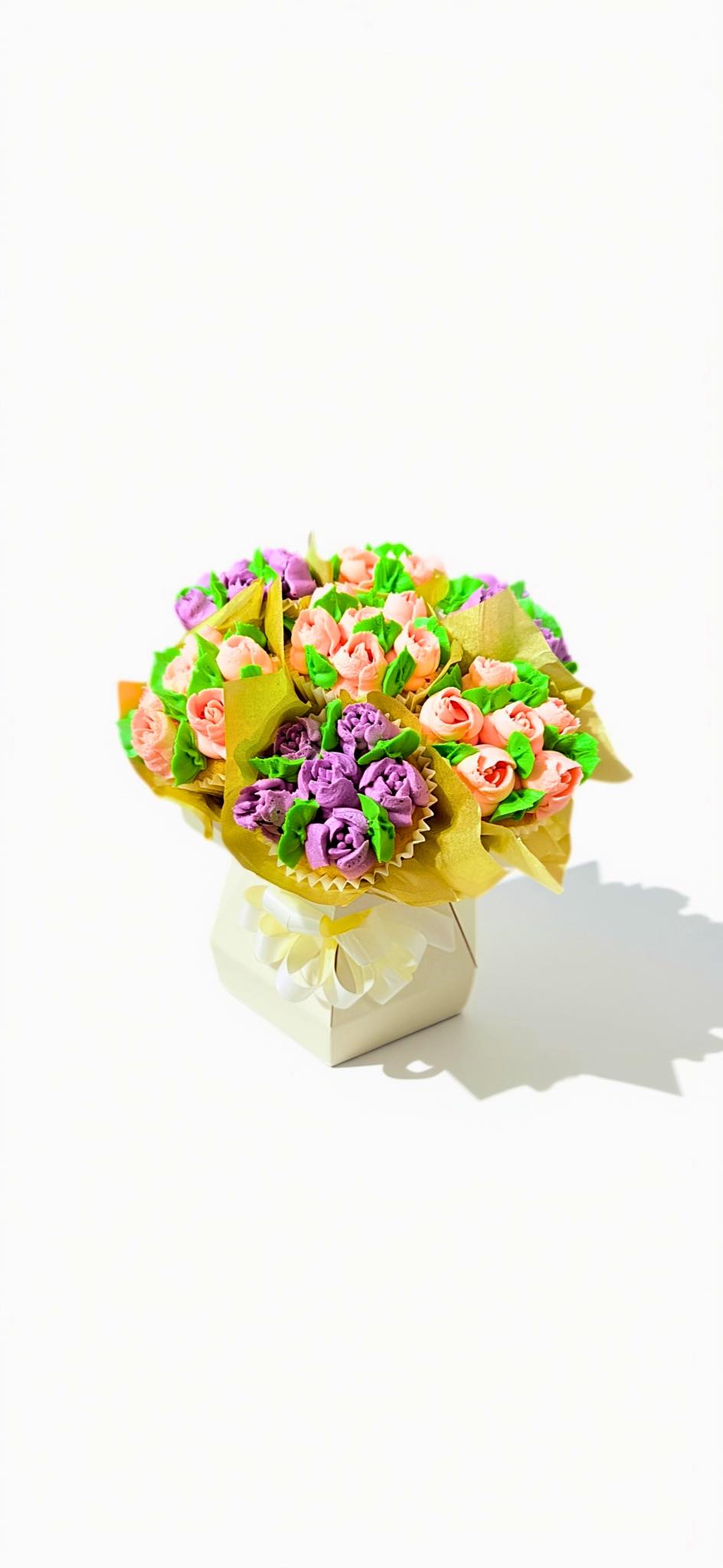 Bouquet of pink and purple buttercream flower cupcakes