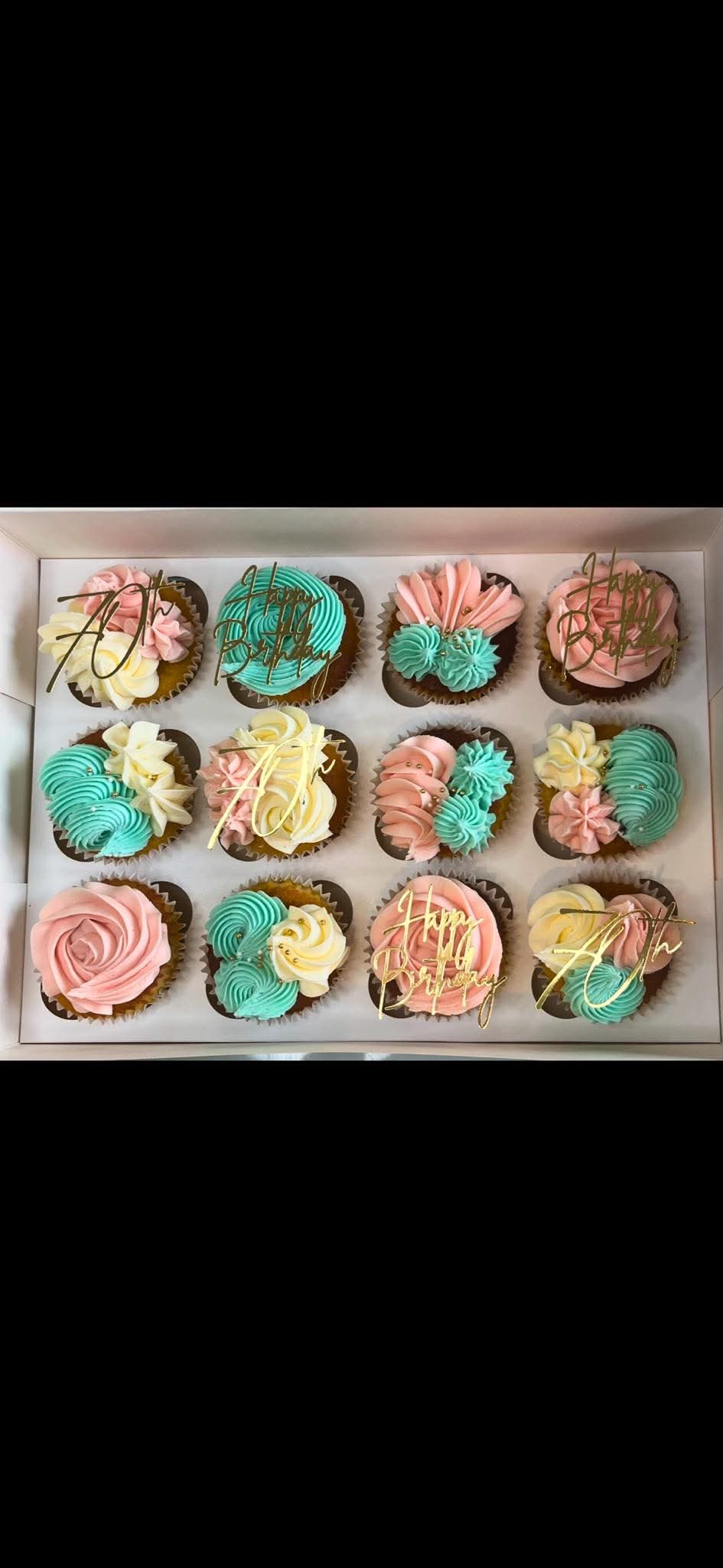 Pink, turquoise and ivory birthday cupcakes with gold toppers